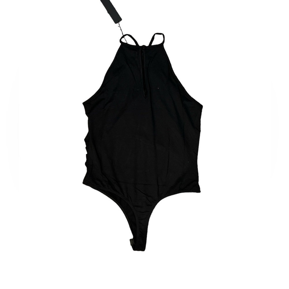 Revolve Krisa NWT women’s Black‎ twisted front Black bodysuit, size Medium.
